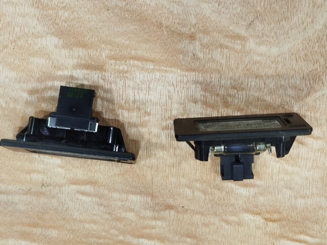 Фонарь подсветки заднего номера 8T0943021 VAG