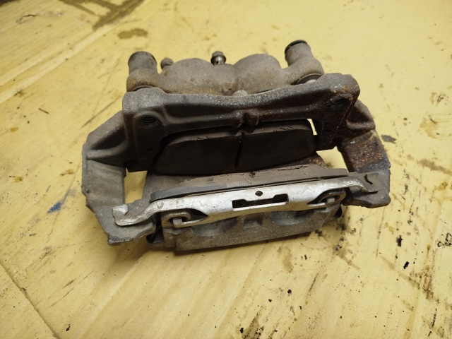 Суппорт тормозной передний левый E1GC2B302AA FORD