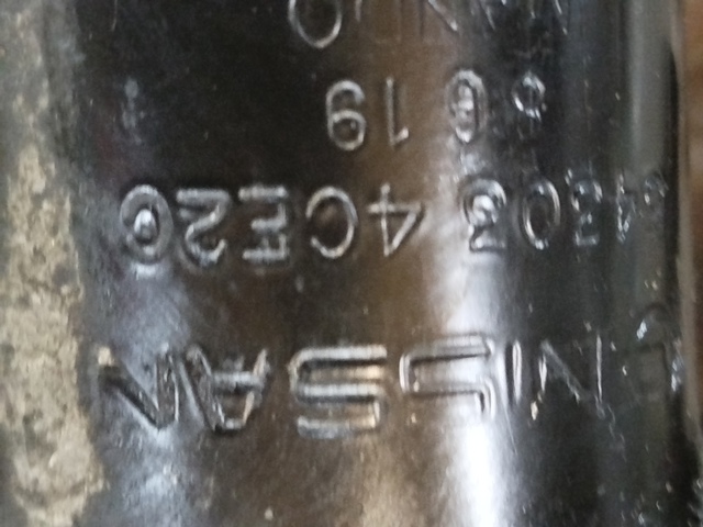 Стойка передняя левая E43034CE2C NISSAN