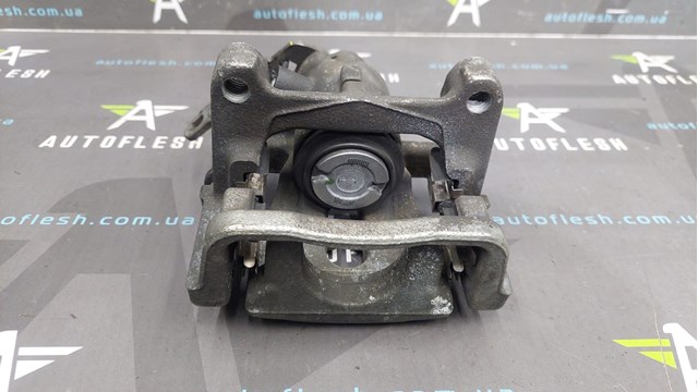 1738987 FORD Суппорт тормозной задний правый купить в Запорожье