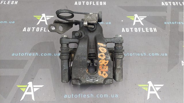 Суппорт тормозной левый задний 1738988 FORD