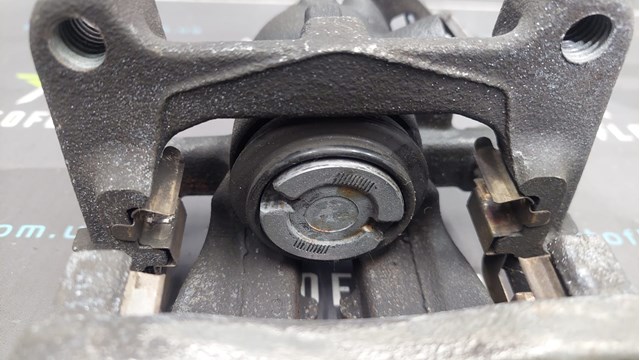 FORD 1738988 Суппорт тормозной задний левый в наличии Кривой Рог