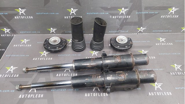 Стойка амортизатора передняя 2E0413023BR VAG