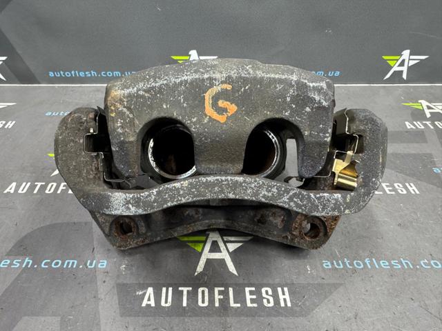41011CC00A NISSAN Суппорт тормозной передний левый купить в Чернигов