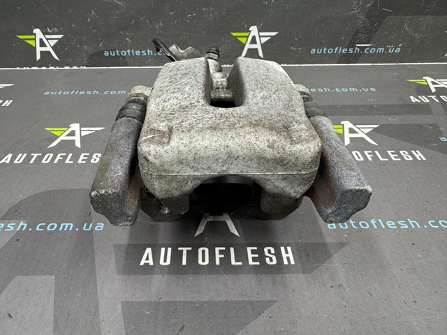 440119906R RENAULT Суппорт задний правый купить в Запорожье