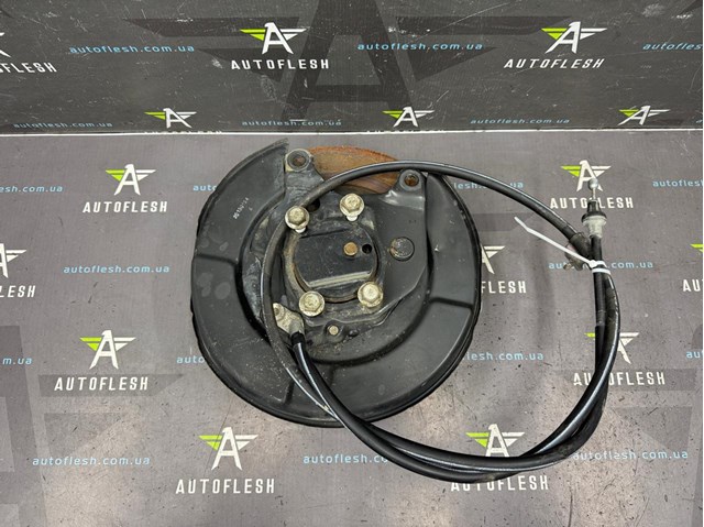 Пыльник тормозного диска заднего левый 44030CY01A NISSAN