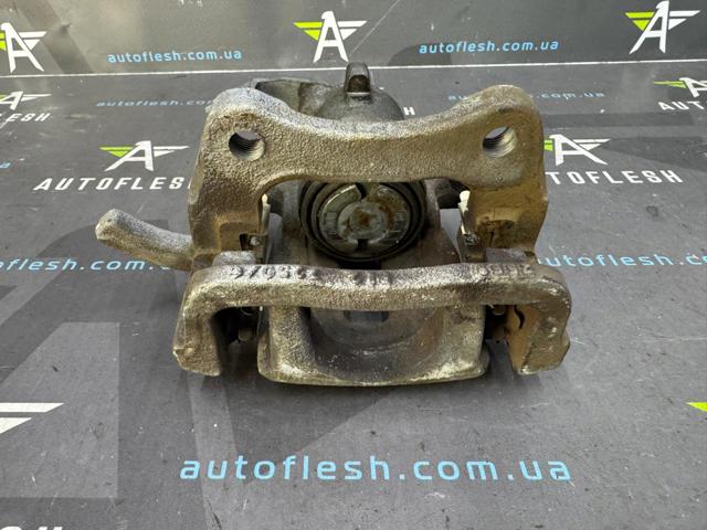 7701209868 RENAULT Суппорт тормозной задний правый купить в Киев