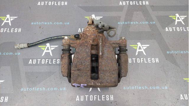 Суппорт тормозной левый задний 7H0615423A VAG