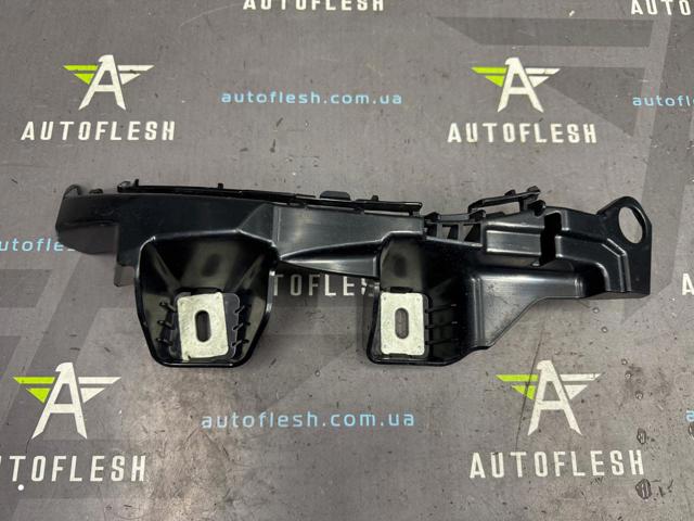 Левый кронштейн крепления бампера заднего A2058850365 MERCEDES