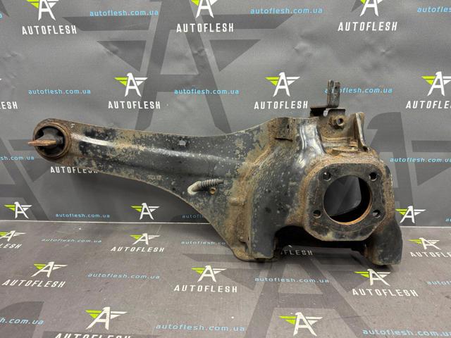 Цапфа поворотная левая EG2528250B MAZDA