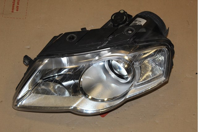 Фара левая Фольксваген Пассат B6
