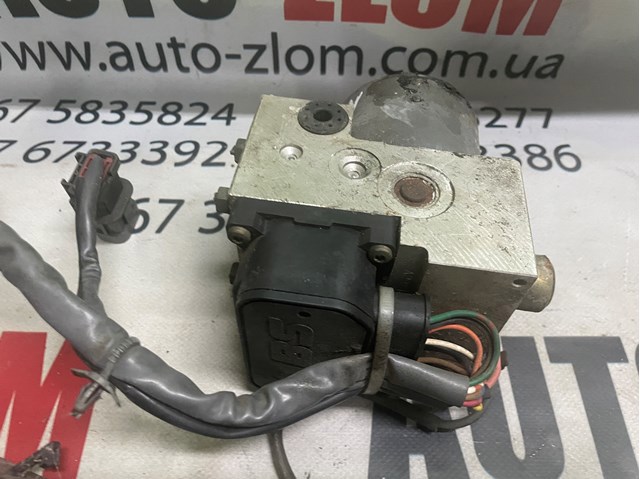 Блок ABS гидравлический 476000L700 NISSAN