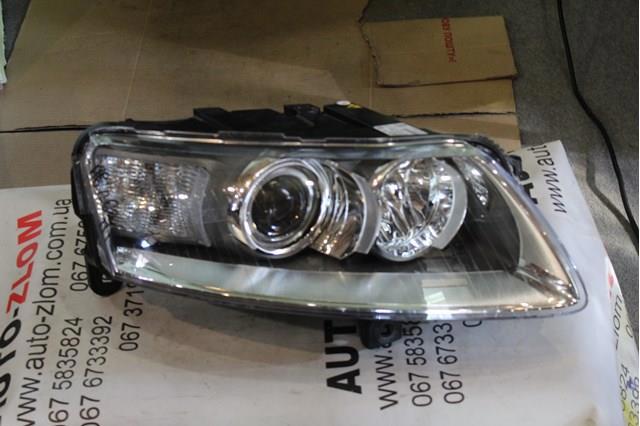 Вставка фары правой 4F0941030EA VAG