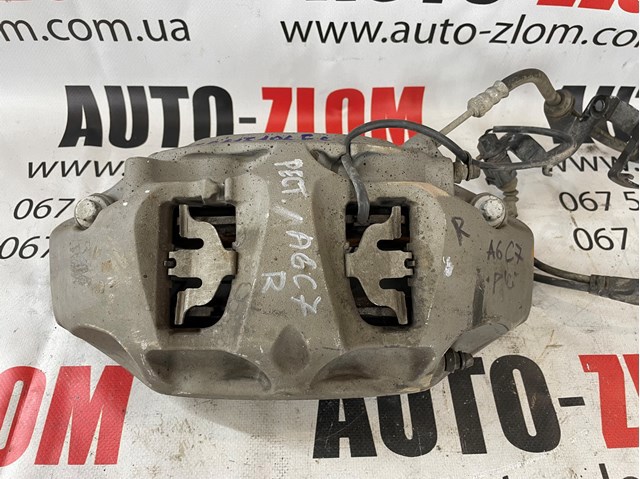 Суппорт тормозной передний правый 4M0615106FS VAG