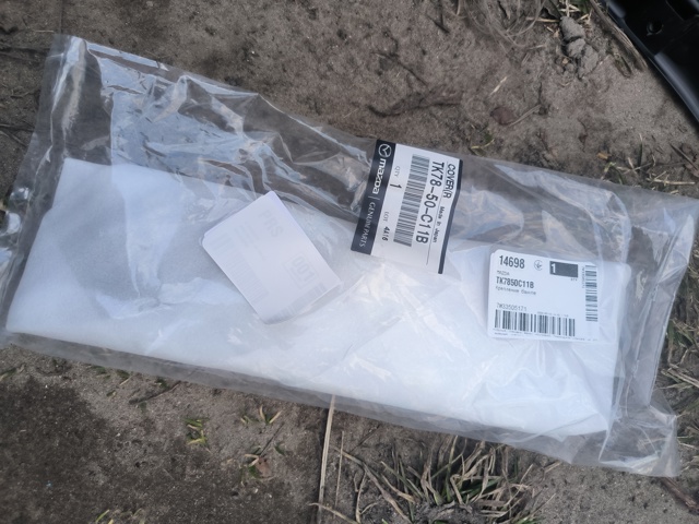 Решетка переднего бампера, левая TK7850C21B MAZDA