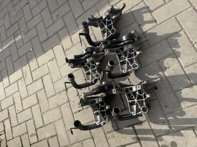 Кронштейн насоса г/у руля 059145169AA VAG