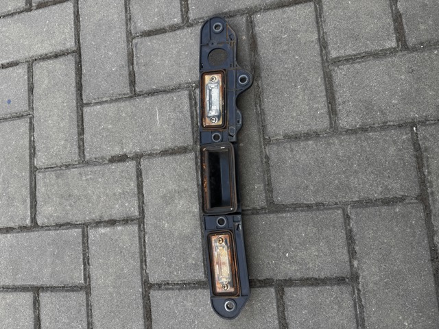 Ручка багажника 1T0827574A VAG