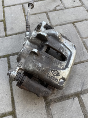 Суппорт тормозной передний правый 7701051808 RENAULT