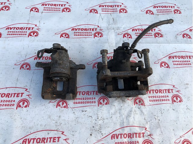 7701056165 RENAULT Суппорт тормозной задний правый купить в Днепр