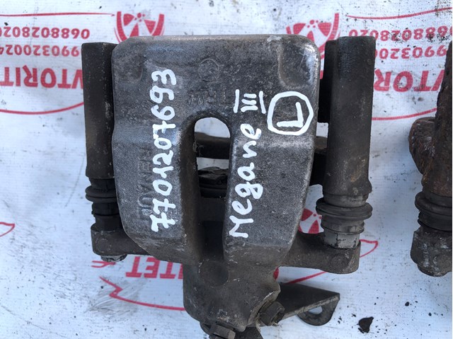 7701207693 RENAULT Суппорт задний левый купить в Винница