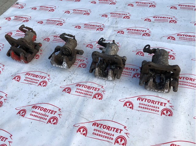 RENAULT 7701209056 Суппорт задний правый в наличии Хмельницкий