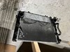 Кронштейн радиатора левый 17117600536 BMW