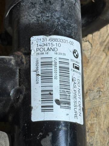 Амортизатор передней подвески левой 31316883331 BMW