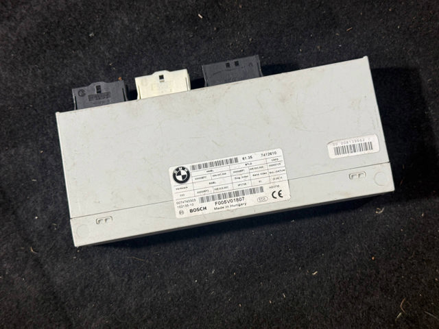 Блок управления открытия крышки багажника 61357412610 BMW