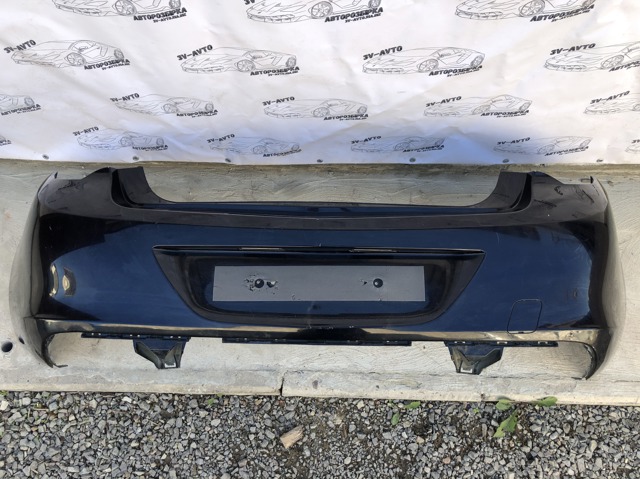 Бампер задний 20877796 OPEL