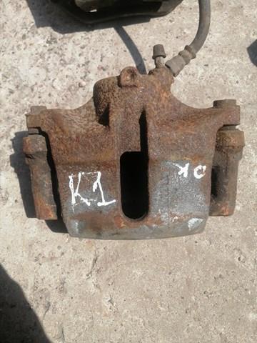 7701207786 RENAULT Суппорт тормозной передний левый купить в Ирпень