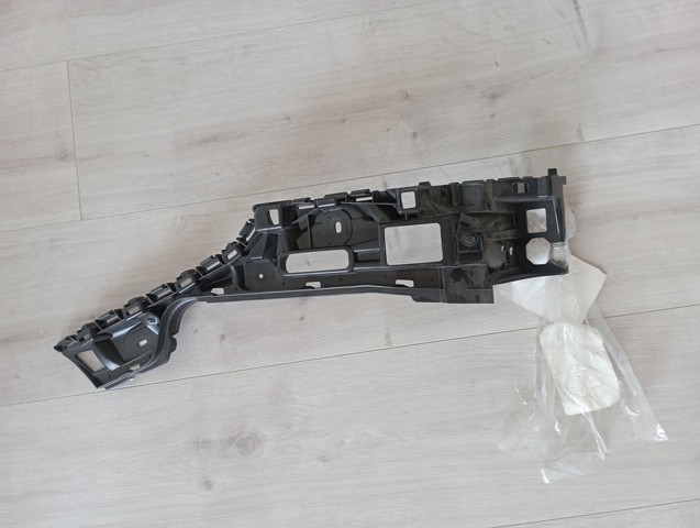Левый кронштейн крепления бампера заднего 7P6807375C VAG