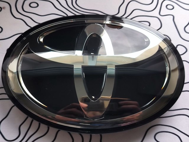 Фирменный значек решетки радиатора 9097502159 TOYOTA