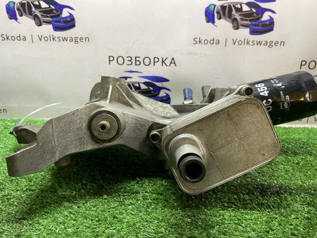Кронштейн генератора натяжной 06J903143AH VAG