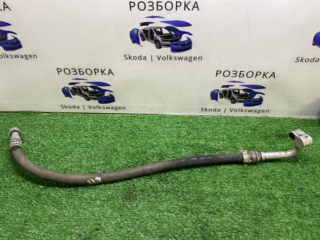 Трубка кондиционера от компрессора к радиатору 1J0820721S VAG