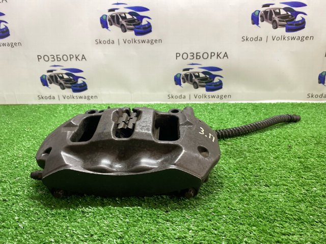 7P0615424 VAG Суппорт тормозной задний правый купить в Черновцы