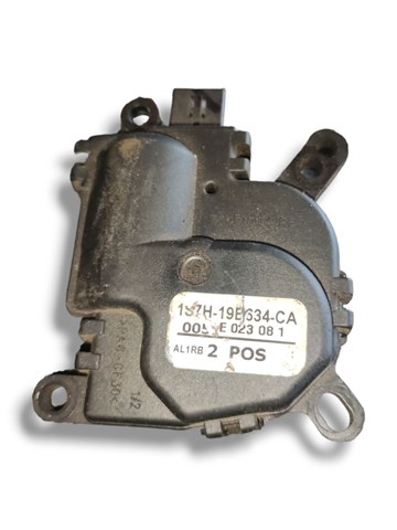Моторчик заслонки печки 1S7H19B634CA FORD