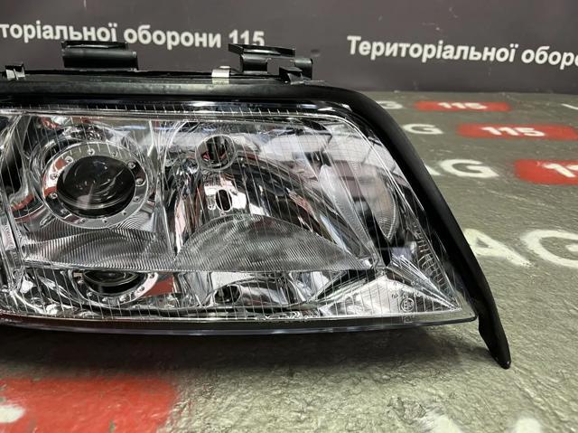 Вставка фары правой 205377082 TYC