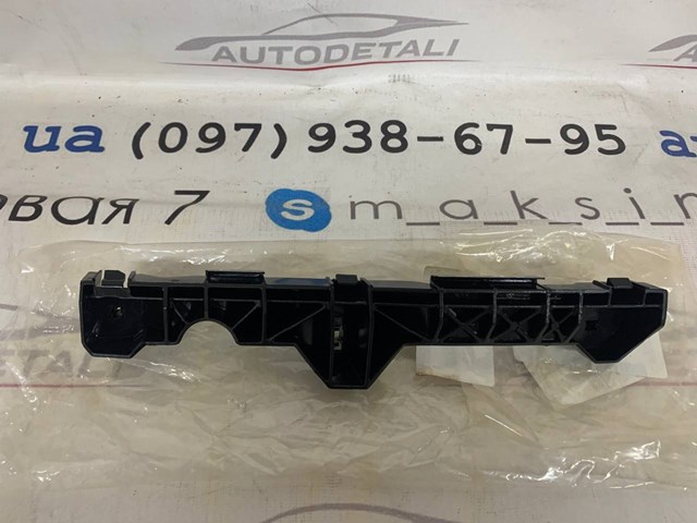 Кронштейн бампера переднего, внешний левый 521460E010 TOYOTA