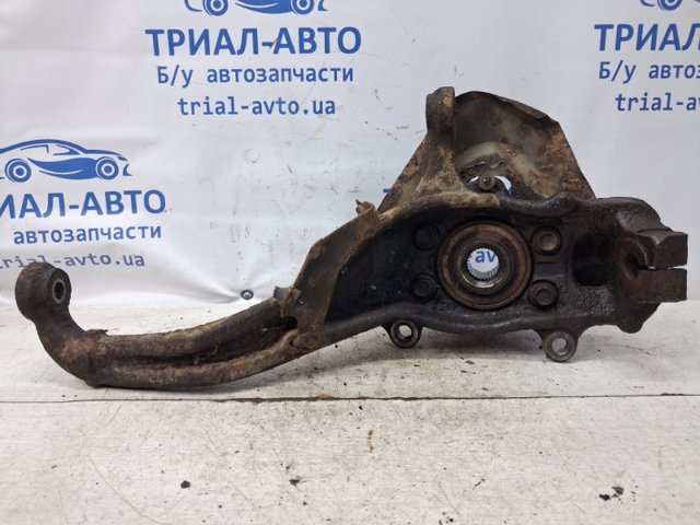 Цапфа - поворотный кулак передний, левый 40015EB000 NISSAN