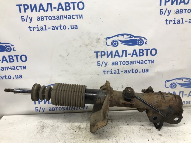 Амортизаторная стойка передняя левая Митсубиси Лансер 10