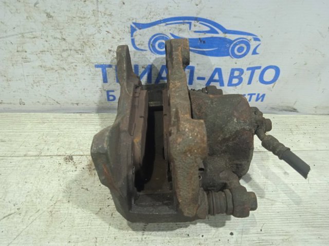41001ET00A NISSAN Суппорт тормозной передний правый купить в Ужгород