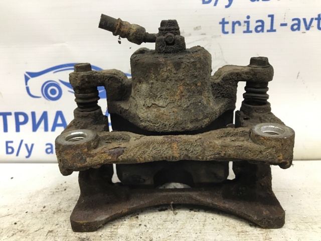 Суппорт тормозной, передний, левый 410111KC2C NISSAN