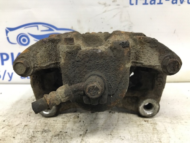 410111KC2C NISSAN Суппорт тормозной передний левый купить в Николаев