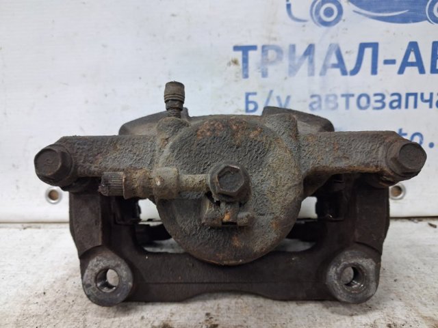 NISSAN 41011JD00A Суппорт тормозной передний левый в наличии Кривой Рог