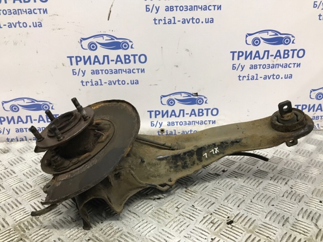 Рычаг/тяга задней подвески продольный нижний, левый 4125A013 MITSUBISHI