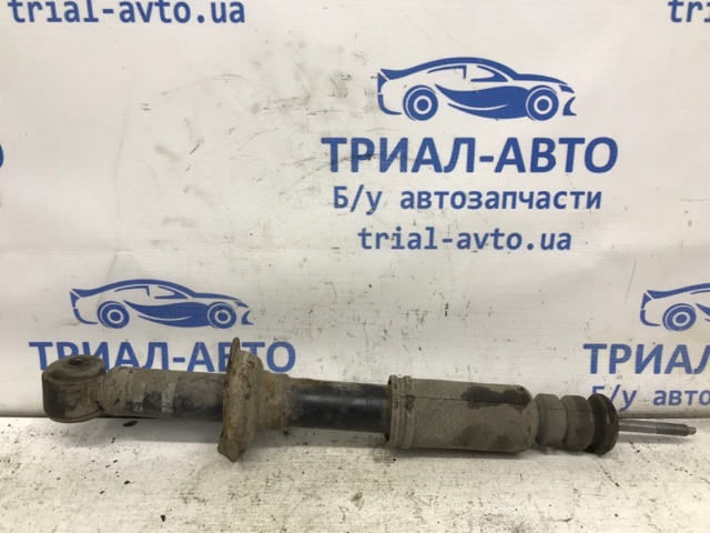 Задний амортизатор Митсубиси Лансер 10