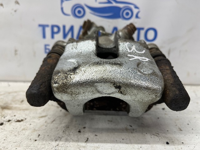 Тормозной суппорт правый задний 43012SEAE01 HONDA