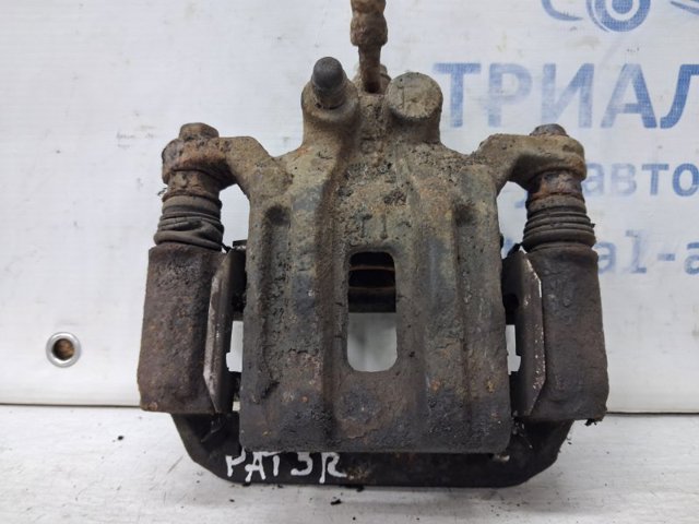 Задний правый суппорт 44001EB30A NISSAN