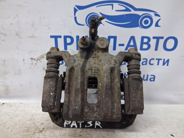 NISSAN 44001EB30A Суппорт тормозной задний правый в наличии Киев
