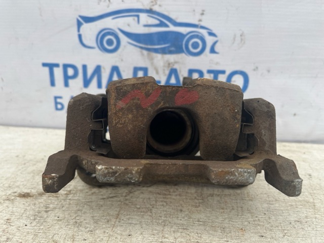 Суппорт тормозной левый задний 440111AA0A NISSAN